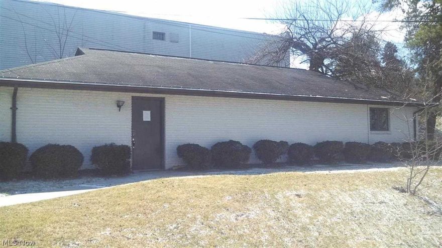 Owner Says Bring an Offer! Formerly a medical office. Plenty of parking!  This all brick one floor office is currently set up with four exam rooms, office, nurses station, kitchen and waiting room. Would make a great office with ample parking for any profession.