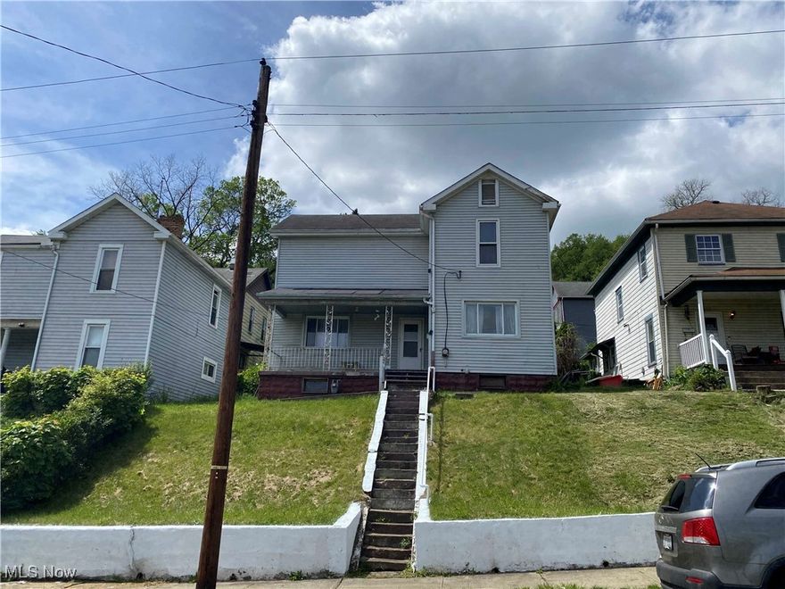 With a little TLC this could be a great home or rental property! Located on a quiet street with great views of downtown. Call an agent to see it!