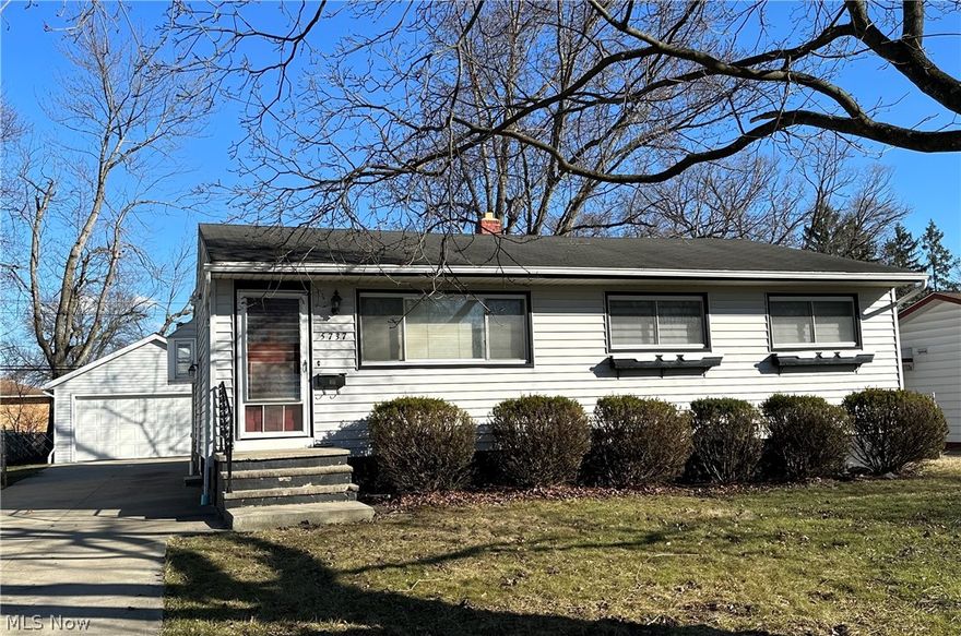 Fabulous opportunity for one floor living at its best! This beautiful and well-maintained ranch style home features three bedrooms, 1.5 baths and laundry all on the main living level! Spacious living room w/gorgeous refinished hardwood floor open to an expansive stunning eat-in kitchen featuring an oversized island perfect for gathering, food prep and entertaining.  Lovely view from the eating area via the sliding door that leads out to the deck and partially fenced rear yard. Spectacular full basement that is partially finished w/glass block windows - perfect for a recreation room, playroom, office, additional bedroom … the possibilities are endless! Tons of storage on the unfinished side and the original laundry hook-up is still available. This home sweet home has been well-loved over the years.  Fabulous updates include two car detached garage (2018), concrete driveway/walk (2018), AC (2021) and more. Convenient proximity to highways, retail, dining, entertainment, medical facilitie