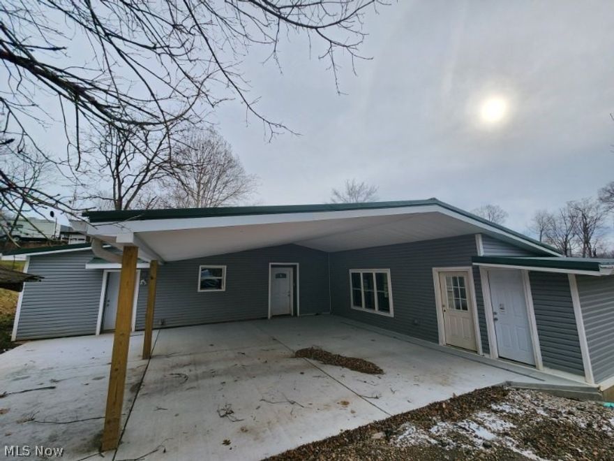 Completely remodeled 3 bedroom, 2 full bath ranch home on 1.3 acres with beautiful river views 25 minutes from I-77, neighboring Mingo Bottom Golf Club, and very convenient to a large grocery store and restaurants.

Being sold AS-IS, there will be structural reinforcement required, hence the price, the seller is motivated and will consider all reasonable offers