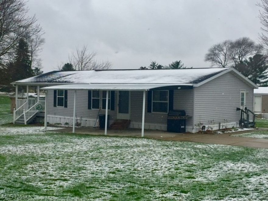 AFFORDABLE, Well kept, Move in Ready! Welcome to 9675 Yoder Rd.  2002 Barrington Elite 2 bedroom, 2 full baths, double parking space.  Spacious kitchen/dining area open to living room. Utility room includes washer and dryer.  All Appliances stay. Wonderful quiet country setting and location with easy access to Akron, Orrville and Wooster.  Living couldn't any easier.  Call for your viewing today!  Land rental is a $500 deposit with approval from Land Owner.  One year lease, $375.00 a month, $50.00 discount if paid by the 20th of prior month. Includes water and septic.