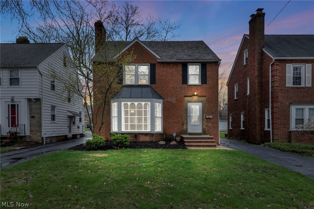 Prepare to be impressed by this stunning all-brick colonial nestled in the highly desirable area of University Heights. This meticulously maintained four-bedroom, two-bathroom home is move-in ready and exudes charm and character at every turn. Step inside and immediately feel at home in the spacious living room, adorned with natural hardwood floors and flooded with natural light, creating an inviting ambiance perfect for relaxation or entertaining guests. Enjoy seamless access to the dining room and kitchen; the warm and inviting kitchen boasts ample counter and cabinet space, stainless steel appliances, and a tiled backsplash. A bonus den with luxury vinyl flooring- ideal for use as a media room, playroom, or recreation area – the possibilities are endless. A convenient half bathroom completes the first floor, while upstairs, you'll find spacious bedrooms with natural refinished hardwood floors and a full bathroom with a linen closet. The third-floor loft area offers a fourth bedroom or recreation space. Head downstairs to the partially finished basement, which features a built-in wet bar and fireplace – perfect for entertaining guests or unwinding after a long day. Outside, a 2-car detached garage provides added convenience (garage roof replaced 2021). Recent updates include a new furnace and central AC installed in 2022, ensuring comfort and energy efficiency year-round, a new front stoop, and much more...With its prime location minutes from shopping, dining, and entertainment, as well as nearby University Square, Cedar Center, Univerisity Hospitals, Cleveland Clinic, John Carroll, Case Western, and Little Italy, this home offers the perfect blend of convenience and luxury living. Don't miss your chance to make this University Heights gem your own!