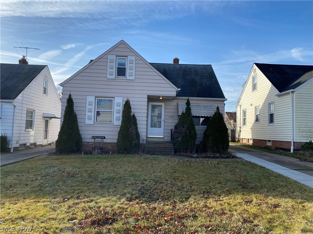 Great 3 bedroom Cape Cod with a 2 car detached garage in a centrally located area of Garfield Heights. Home has newer flooring throughout along with replacement windows, a newer furnace and CAC, and updated electrical panel. Kitchen has appliances included and has a separate dining area. New carpeting in the living room and in the two bedrooms on the first floor. Upstairs is a large bedroom with built-ins and a separate sitting area space.. Basement is partially finished with a large rec room and a utility room with the washer and dryer included. This home is conveniently located close to shopping, schools, and easy freeway access. Hurry and schedule your appointment!