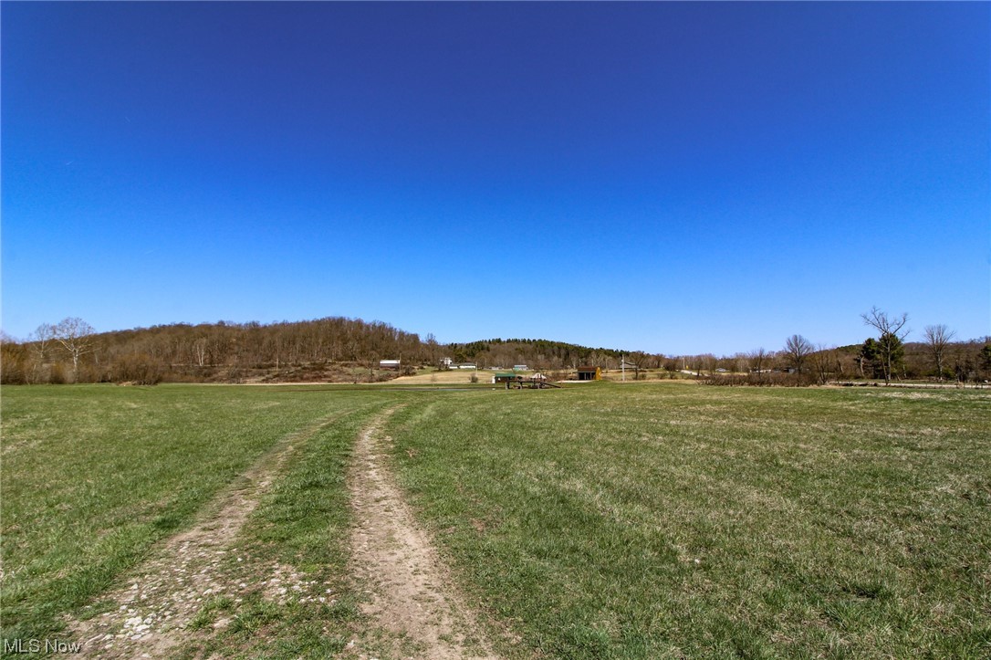 41.05 acres, cabin, and stocked pond for sale in The Hocking Hills! 12 x 20, one bedroom & one full bathroom. 3 baseboard heaters. French door to the kitchen area. Tankless water heater. Window A/C. 12 x 20 covered deck. The pond is 16 feet deep & stocked with bass, bluegill & catfish. Camper site with 30 amp electric. 10 x 20 log storage cabin. Hunting, fishing & swimming!! Annual taxes are $2300.70.