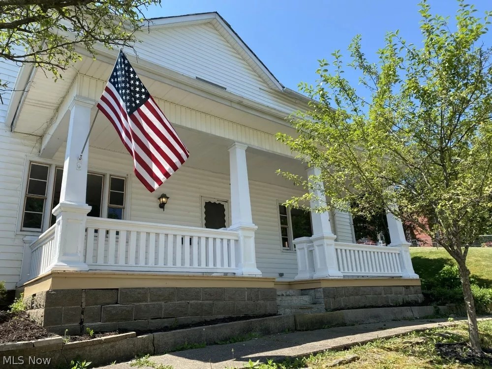Here’s an opportunity to buy a 2 story home in the Village of Caldwell, located near SR 821 and only a few steps to Church or School! The home is 1,936 sq. Ft. With 3 bedrooms, 1 bath along with kitchen, living room, utility room and den. There is new carpet through out most of the house while still maintaining its old world charm with an impressive staircase and wide trim. The front porch invites you to pull up a chair and watch cars roll by. The home has central air and gas furnace.
There is an older detached garage+workshop and a large back yard with shade trees.
