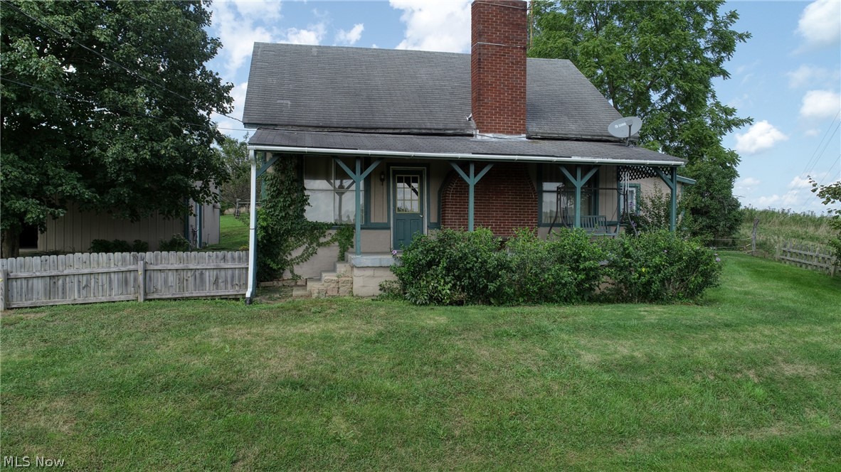 Adorable mini farm with 21.766 acres! Darling, quaint 1900's, 3 bedroom farmhouse w/ large covered front porch. Wood floors. Large detached garage. Barn & farm fencing. Separate singlewide. 2 wells & 2 septic tanks. MINERAL RIGHTS TRANSFER.