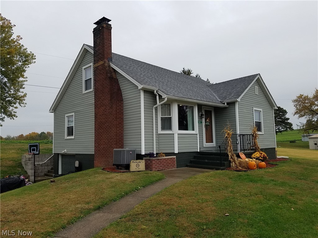 CHECK OUT this COMPLETELY UPDATED 3 bed 2 bath CAPE COD STYLE home with a 1 car integral garage sitting on 1 FULL ACRE! Over 1700 SF of MOVE IN READY living space in a BEAUTIFUL COUNTRY setting! Featuring a front covered entry and a rear covered deck, PLUS a LARGE storage shed for all the extras. The kitchen offers plenty of cabinet and counter space plus stainless steel appliances, while the formal dining room lets you add more guests to the list! The convenience of two bedrooms on the main level allows the entire 2nd floor to contain the MASSIVE 3rd bedroom!! Let's look at the HIGHLIGHTS... New appliances, new wiring, new windows, new roof, new siding/gutters, new flooring, new drywall and new insulation throughout the house. The basement/lower level is partially finished housing the rec room, laundry and a workshop! SUCH A GREAT BUY...CALL TODAY!!