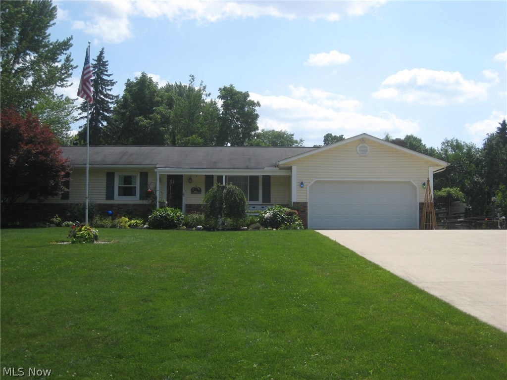 Looking for a ranch! This custom Amish built home has been meticulously maintained and thoughtfully updated. As you pull in on the newer concrete drive and approach the house, you'll experience a warm and inviting feeling. The front porch welcomes you and as you step in, you'll love the beautiful hardwood flooring. Light, bright and open as you walk through. The kitchen with custom Hickory cabinets and lots of counter space has a wall of cabinets, newer appliances and laminate flooring. It opens to the dining area with a large bay window overlooking the beautifully landscaped yard with privacy fence and the family room with a full wall Brick fireplace w/gas logs and hand hewn mantle. The sliding door opens to the covered deck. The yard features a shed with a brick patio, a pergola with a swing and a fire pit. Great for entertaining. The master bedroom features a triple closet and a remodeled half bath. Bedroom 2 is equally as large and the 3rd is being used as an office. The l