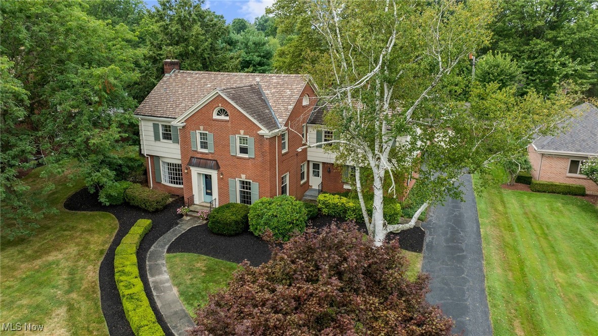 Welcome to 331 Golf Drive - Nestled along the fairways with gorgeous golf views in every season, from spring blooms to autumn colors to peaceful winter landscapes, this 3-bedroom plus den/nursery and 3.5-bathroom home will fit all your needs. Traditional charm combines with modern style in this beautifully updated and meticulously maintained residence. The stunning living room offers a cozy fireplace and lovely windows showcasing views of Trumbull County Club. Adjacent to the living room is a gorgeous all-season sunroom overlooking the lush backyard. You'll enjoy the upgraded kitchen, highlighted by quartz countertops and a wonderful center island. Two second-floor master suites await, including the main suite which features a spa-like attached bath along with a walk-in closet. All of the bathrooms have been updated, along with new windows, HVAC and hot water tank. Additional amenities include a relaxing backyard with stone patio, 4.5 car garage and an expansive driveway. All of this is in Warren's most desirable and elite neighborhood of distinguished homes.