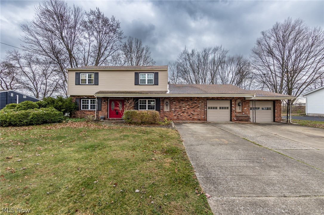 Welcome to this darling Colonial home in Macedonia! Stepping into the home, you will see the nicely sized living room with the new laminate flooring, large brick fireplace and decorative beams! Through the living room, you will walk into the eat in kitchen and dining area that opens up to a living room with vaulted ceilings. This area will be the perfect spot for entertaining during these holiday months! The kitchen has brand new stainless steal appliances and a great island to gather around. Upstairs are four nicely sized bedrooms with the master having an en suite! All the bathrooms have been updated! This backyard is stunning, it has a nice covered patio that overlooks the inground pool, but you still have plenty of green space in the yard as well! Roof windows and siding were updated 8 years ago! Call today for your private showing!
