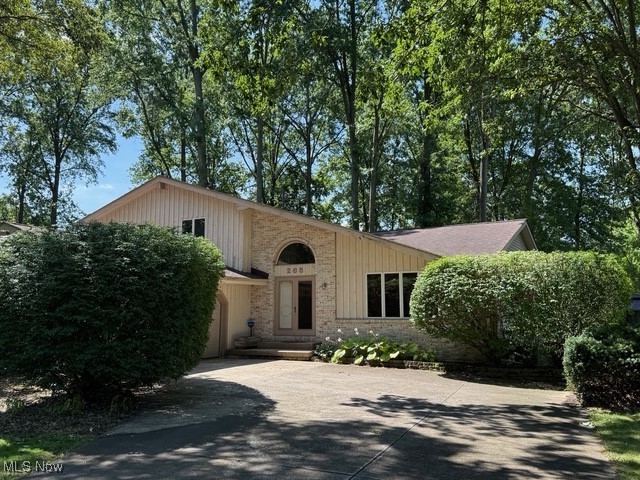 Welcome Home! This spacious 4 bedroom, 3 bath split-level with contemporary flair, is ready for its new owner! Step inside to a stunning two-story foyer that sets the tone for the open and updated kitchen, perfect for entertaining. The kitchen overlooks a cozy lower-level family room featuring a gas fireplace, ideal for relaxing evenings. A convenient bedroom is located on the lower level, while the second floor feature two additional bedrooms plus a spacious master suite. The basement offers a partially finished space with great potential for a playroom, office, or workout area. Major updates include a new furnace and a/c in 2014 and new roof in 2013. Don't miss the opportunity to make this home your own- come see the possibilities!