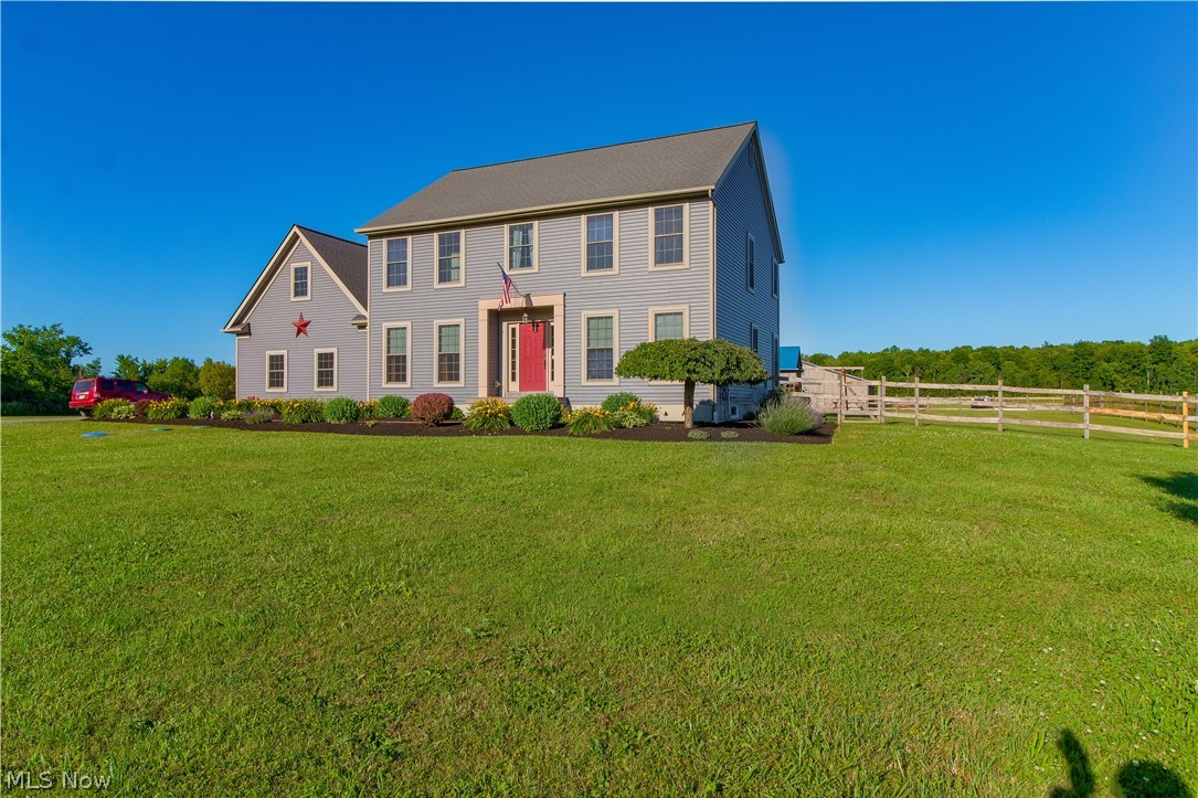 Who says you can’t have it all??? You can in this 3,300 square foot 4 or 5 bedroom 3 full bath stunner. Sitting on 8 pristine acres this contemporary colonial boasts a beautiful granite kitchen with stainless steel appliance package, pantry, Kraftmaid cabinetry and farm sink, a first floor full bath, a unique and totally cool dog bath, luxurious living room, family room and a flex space that can be a 1st floor bedroom, office or exercise room. Spacious master bedroom with walk-in closet and master bath that features dual sinks, a garden tub and walk-in shower. You’ll enjoy the private guest or 4th bedroom, second story office and second story laundry area. Full high and dry basement, geo thermal closed loop heating system. 3 car attached and heated garage. Outside the landscaping is on point and adds to the awesome curb appeal. There’s a 120’ x 144’ fenced in back yard/play area, Trex decking, a marvelous in-laid brick patio and walkway, a 48 x 36 barn with 4 box stalls plus a 10 x 48