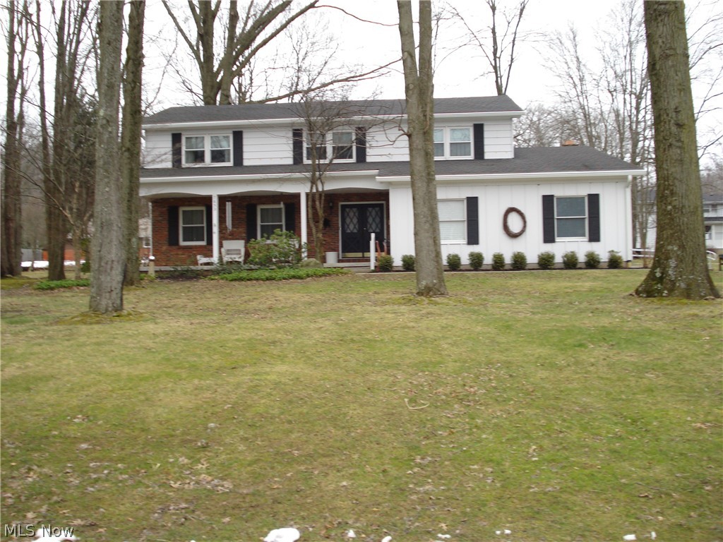 Spacious 2364 sq. ft. 4 bedroom 2 1/2 bath Colonial with full front porch and attached 2 1/2 car garage. Huge 19x13 Living Room and 12x11 formal Dining Rooms with wood laminate floors. 20X13 Family Room with brick fireplace (gas). Equipped kitchen with built -in double oven, dishwasher, and gas cook top. Full basement with built-in bookshelves. Recent updates include Hot water boiler (2013) HWT (2018) Water Softner (2016).Wheel chair ramp and lift (wheel chair elevator) are included in sale.