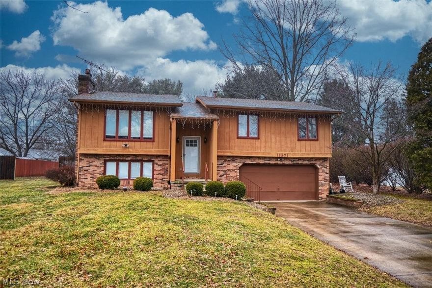 Welcome to 11371 Sagebrush Ave. NE in Uniontown, located in the sought-after Westview Estates neighborhood. Built in 1978, this well-maintained bi-level home offers 3 bedrooms and 2 full bathrooms with a functional layout designed for comfortable everyday living.

The main living spaces provide a warm and inviting atmosphere, while the partially finished basement adds valuable additional square footage—ideal for a rec room, home office, workout space, or entertainment area.

This home also offers wonderful indoor-outdoor living. Enjoy quiet mornings or relaxing evenings in the enclosed porch upstairs or the screened-in porch on the lower level, both providing peaceful views of the backyard. The fully fenced-in backyard creates a private outdoor space perfect for pets, play, or gatherings.

Situated in one of Uniontown’s most desirable neighborhoods, this property offers the perfect combination of space, comfort, and location—a fantastic opportunity to live in the highly regarded Westview Estates community.