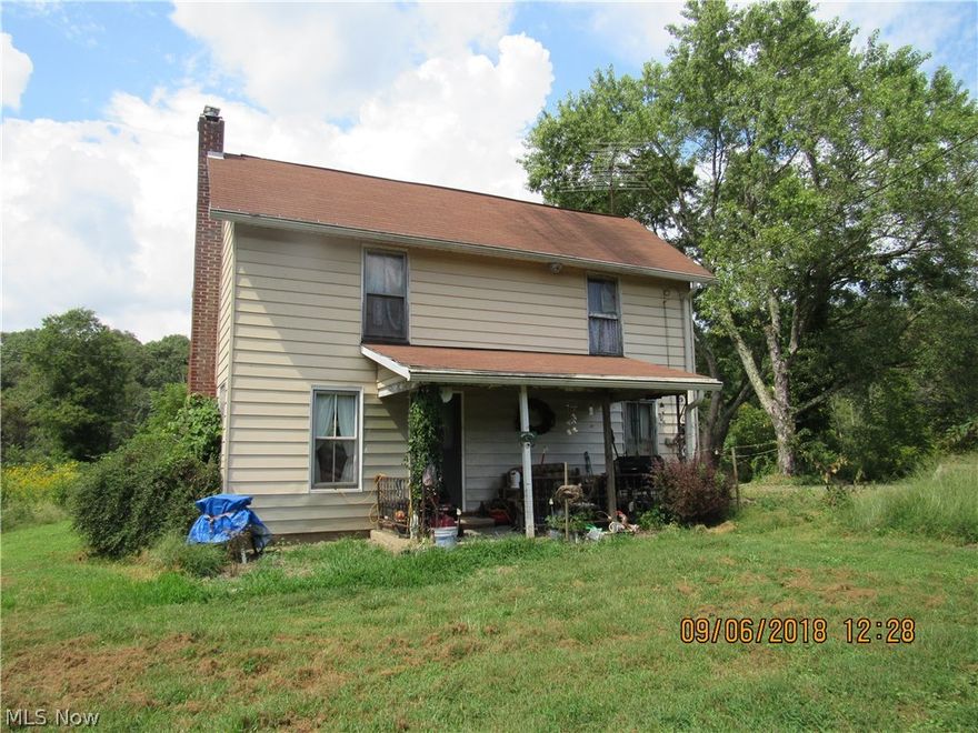 Older 2 story home on approximately 5 acres. 3 bedrooms 1 bath, one bedroom down.  Home features newer electric furnace and AC, 1st floor laundry. APpliances stay. Currently has propane but Free gas is available as long as it lasts. Well & Septic but public water available if buyer wishes to add tap. Approx coast $2,000.