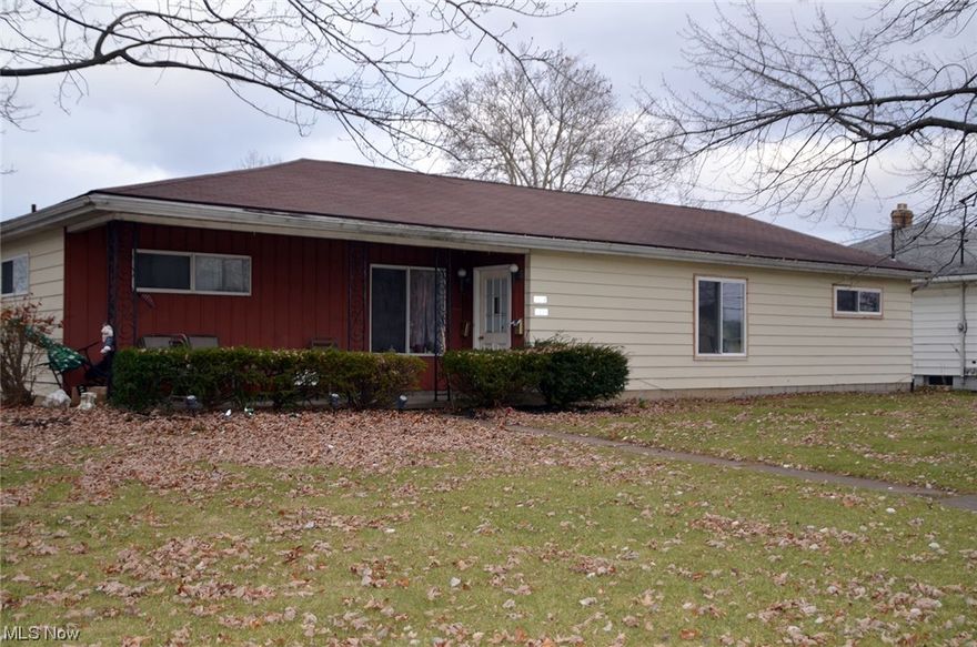 Updated to like new condition.  Freshly painted through out.  New interior doors.  Window are new vinyl with double insulated glass panes. The kitchen has brand new wood cabinets  There is a great amount of cupboard space.  Huge pantry, built in dishwasher, garbage disposal and microwave.  Range and refrigerator are included.  New floor and beautiful new laminated counter tops. The kitchen also has a nice eating space with plenty of room for a dining table.  The living room is very large over 18 feet long.  Plenty of room to manage your furnishings.  Each bedroom is large and has huge closets.  The bath has big vanity with space to store all your toiliteries, plus plenty of counter space to make it easy for daily grooming.  The bath boasts a tub plus ceramic tile shower walls. There is a detached garage with electric door opener.  There is also patio space between the garage and building.  You are going to love your new home.