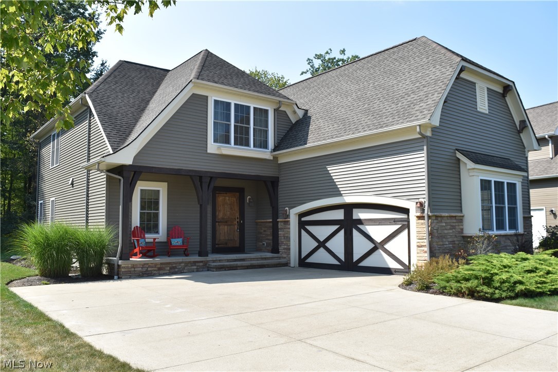 Incredible Custom Built Payne & Payne Home in desirable Hidden Glen Community! This home offers 4 Bedrooms, 3 Full Baths, over 2800 sqft of living space, and beautiful Brazilian cherry hardwood floors on first level. Foyer entrance welcomes you through to the 2-story Great Room with soaring wall of windows, gas fireplace and open to Dining Room. Well-appointed Gourmet Kitchen with granite counters, wrap around breakfast bar, center island, stainless steel Jenn-Air appliances, pantry & built-in Officette. 1st Floor Guest Bedroom with full bath. Second level offers 3 additional spacious bedrooms, each with a walk-in closet. Vaulted Master Bedroom Suite with expanded walk-in closet/dressing area & large Master Glamour Bath includes granite vanity with two sinks, oversized spa-like ceramic shower & soaking tub. 13-course Basement is plumbed for full bath. 1st floor Laundry & Mudroom with built-in lockers, slate floors and access to 2-car attached Garage. Double-wide concrete driveway. Beau