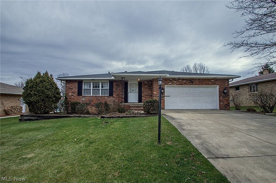 Most desirable 3 bedroom 2 bath full brick center hall ranch!  Living and dining rooms are quite spacious and feature neutral carpet. Bright, cheery kitchen with skylight offers abundant cabinet space, breakfast bar, all appliances, and is open to the family room which has full bath access along with patio door access to back yard deck. Master bedroom also has access to full bath with double shower.  Bedrooms offer either hardwood floors or hardwood under the carpet.  Lower level is partially finished with rec room and separate office, workshop area and laundry area with washer and dryer and laundry tub. Garage is 2.5 attached with hot and cold water, drain, attic storage.  Updates include extra insulation in attic and paneling in rec room, 30 year roof (tear of), HVAC and irrigation system.  Enjoy the parklike lot with garden area and convenient location off Hillside Rd. near freeways, shopping, etc.