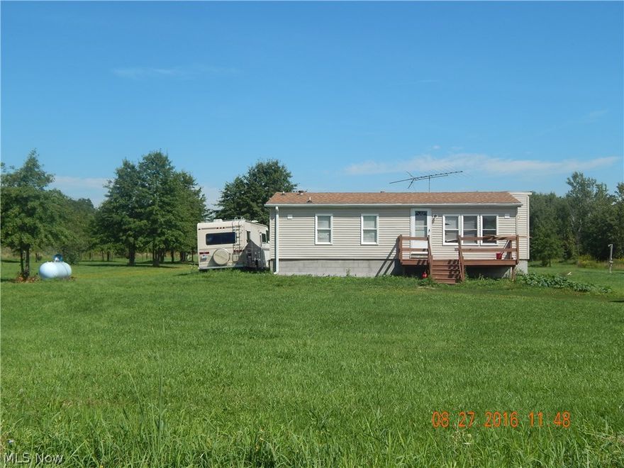 New carpet through out! Finished basement for an additional 1,000+ living space! Basement has unique moveable walls to increase the bedroom size that is down there into one or into two and yes it is a walk out basement! This is great country living! Peaceful setting for morning coffee either on your front porch or back patio either place you are surrounded by mother nature! Marble counter tops in the kitchen with a great open and airy floor plan great for entertaining family or friends. First floor laundry in hallway bathroom  makes it easy to perform this chore. Water filtration system in basement was installed in 2011. This is a great home for anyone who loves open floor plan and country living. There is a large Shed on property that measures 16 x 16. The basement has a battery back up sump pump that was purchased in May 2015, A new well pump was put in June 2015, The roof and siding were done in 2012. There have been plenty of up dates done to this home do not miss out.