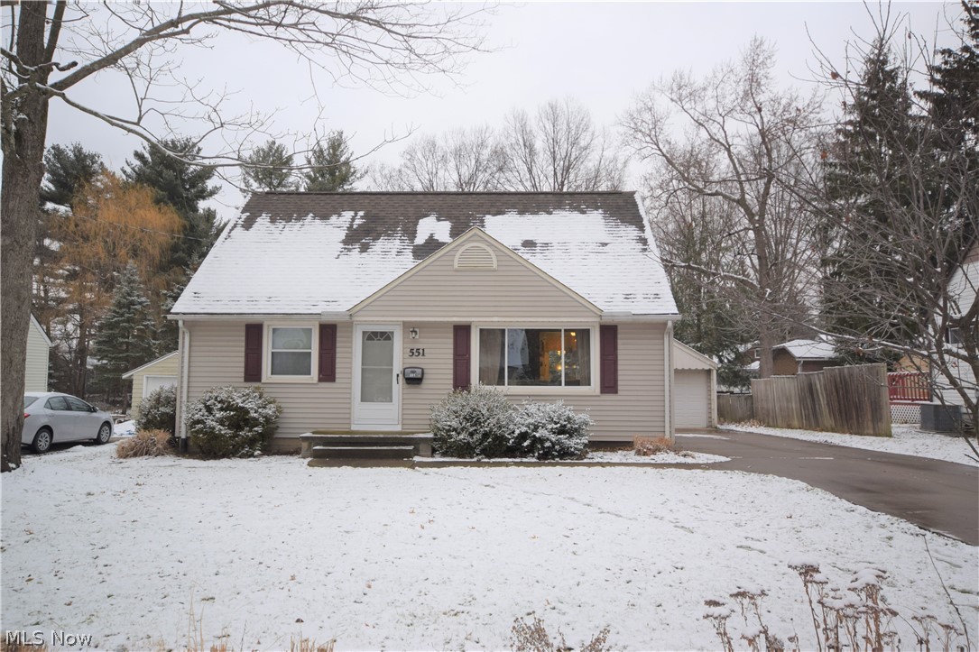 Welcome to 551 Valleyview Street in Kent! This lovely cape-cod home has endless updates and wonderful features throughout. Step through the front door into the living room with gorgeous hardwood floors. The sparkling-clean, spacious eat-in kitchen has multiple updates and tons of cabinet space. Kitchen window overlooks the large fenced-in backyard; back door leads to wooden deck in the backyard. Two bedrooms on main level along with a full-bathroom that has beautiful tile covering the walls all the way to the ceiling. Head upstairs to find a third bedroom and a second full bathroom. The upstairs bedroom and bathroom have tons of convenient storage space. The walk-out basement is partially finished with a kitchen, living room area, and a full bathroom. Kitchen area has a stove, fridge, sink, and cabinets. Laundry hook-up located in basement. This home is conveniently located just 0.3 miles from Kent State University campus. Don’t miss out on this outstanding home!