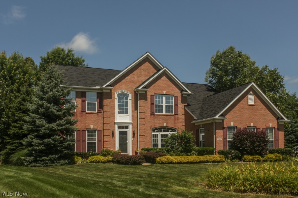 60K Price Reduction!! Stunning 4 bedroom colonial former model that features almost 5000 square feet of living area. The gourmet kitchen features 42" upgraded glass maple premium cabinetry, brand new granite counter tops, brand new stainless steel appliances including double ovens, new lighting, and a giant center island. You will love the sun filled morning room right off the kitchen that boasts a vaulted ceiling and a view of the park like backyard. Acres of solid maple hardwood floors flow through the first floor.A 22' by 19' family room is also open to the kitchen and features a stone surround fireplace and 9' ceilings. The formal living room and dining room greet you with elegant bay windows, custom draperies, chair rail, and a tray ceiling.
The dramatic two story entry foyer and grand staircase lead you to the luxurious master suite with recessed tray ceiling, gorgeous double sink glamour bath, a sitting area, and his & hers walk-in closets. 3 additional bedrooms adjoin the