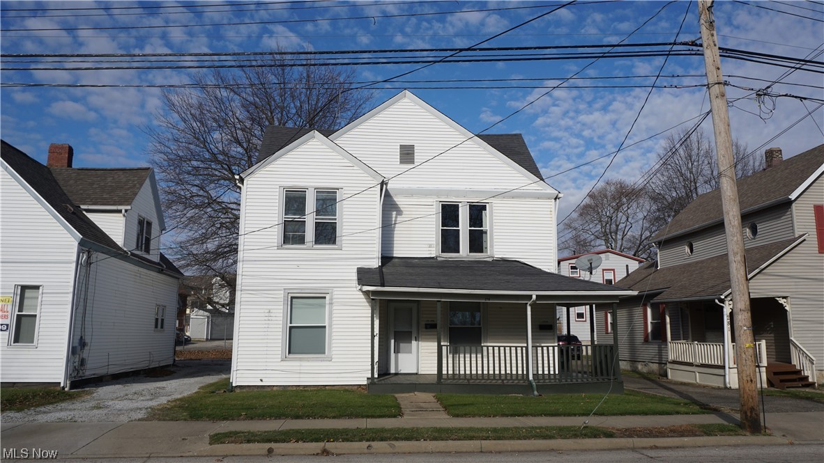 Amazing investment opportunity just South of the University of Akron campus. Located within walking distance of most of the campus, this 2-unit is perfect for student rentals. The lower unit has 3 spacious bedrooms, a sizable family room, an eat-in kitchen with range and refrigerator, a full bathroom with walk-in shower stall and a bonus room suited for a dining room or 4th bedroom. The lower unit is equipped with plenty of storage as well. The upper unit also has 3 bedrooms, each with adjoining spaces fit to be used as personal study areas. A large common room, eat-in kitchen with range and refrigerator, a full bathroom, and a flex room are accessible by all the upper-level tenants. Similar to the lower level, the flex room has the potential to be used as a 4th bedroom. Access the basement from the rear exterior of the home. The basement is perfect for additional storage and is also home to convenient coin-operated laundry equipment. Outside, a large front porch is perfect for social gatherings and a large gravel parking lot provides ample space for your tenants' vehicles. Updates: HWT 1 – 2019, HWT 2 – 2015, Upstairs Carpet - 2023, Interior Paint – 2023. Don’t miss out on this tremendous move-in-ready property with excellent income producing potential. Add this one to your portfolio or get your start as a real estate investor.
