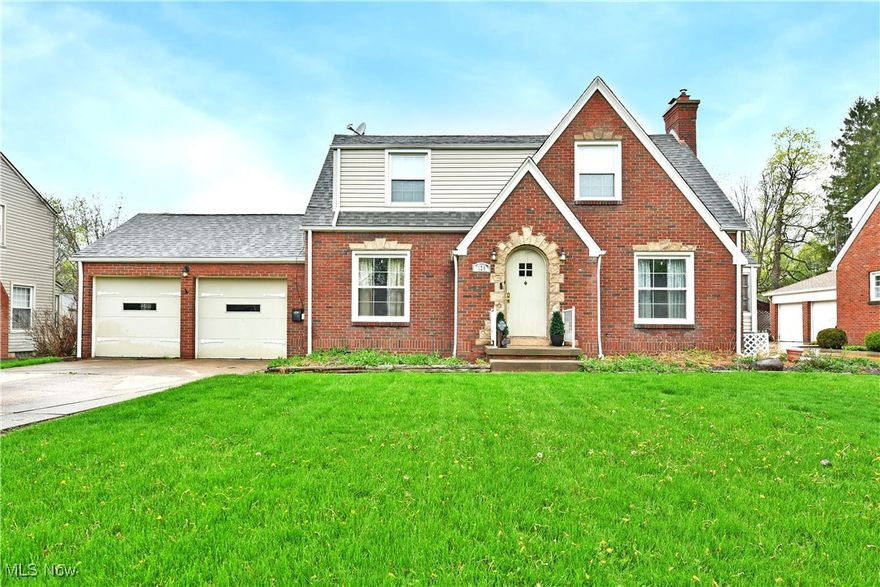 A perfect place to call home!  You will love the charm and design of this well maintained Boardman home. The attractive brick and stone work gives Tudor style vibes, then step inside the original arched front door  to the newly refinished natural hardwood floors in the main living areas. The large living room has a wood burning fireplace and entrance to an enclosed patio that leads to backyard. The whole house has a fresh coat of paint. Formal dining room with original wainscoting and crown molding.  All appliances stay in your nice sized kitchen complete with extra dining area, beautiful back splash, counter tops along with tons of cabinet space and new laminate wood flooring. There is a 1/2 bath between kitchen and living room for added convenience.  3 large bedrooms upstairs and a recently renovated full bathroom. Basement is partially finished and is a great bonus area. Basement has a walk up to the Large backyard with concrete patio and is fenced in for all of your outdoor activities. Access to your 2 car attached garage from the kitchen. New Furnace/Ac Unit in 2022