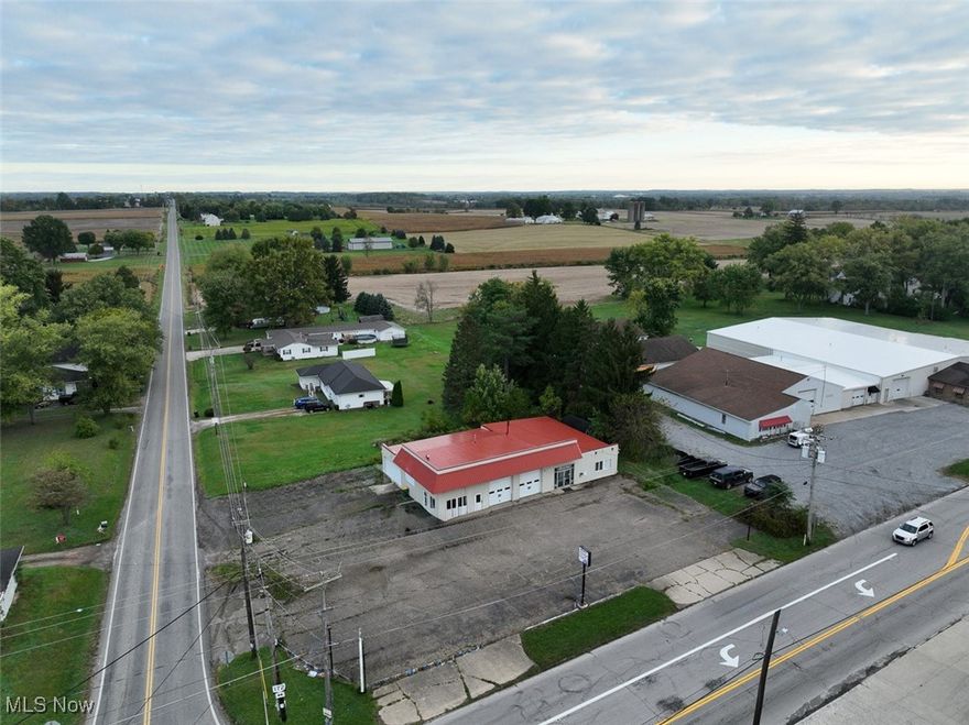 Attention Investors and Business Owners, 3,700 Sq. Ft. Commercial Building, Corner Lot, No Zoning. Tusc. Twp., Stark County, Tuslaw Schools. Live Auction with Online Bidding Available on Real Estate. ABSOLUTE, all sells to the highest bidders on location. ONLINE BIDDING BEGINS TUESDAY, NOVEMBER 4, 2025, AT 12:00 PM, AND AUCTION LIVE ON-SITE BIDDING WILL BEGIN FRIDAY, NOVEMBER 7, 2025, 12:00 PM - REAL ESTATE SELLS AT 12:30 PM. Prime commercial property located in Western Stark County — a corner parcel situated at the intersection of Alabama Avenue and State Route 172. This property offers excellent access and high visibility. The 3,700 sq. ft. building is currently configured for an auto repair shop and dealership but can easily be adapted for a variety of commercial uses or even converted into a two-unit. The building features three overhead doors (10x10, 10x10, and 9x14) leading into heated shop space, a glass-front waiting room, two bathrooms, multiple offices, and a utility room/storage space. There is also a large conference room with a kitchenette, providing plenty of flexibility for business operations. Additional features include gas heat (forced air and radiant floor), well water, breaker electric, and a septic system. A paved parking lot offers convenience and room for customers or equipment. This is packed with potential whether you’re expanding your business, investing, or developing for a new use. Come see for yourself! Stark Co. parcel #7200271. Half year taxes are $1,111. Property is subject to a permanent ODOT roundabout easement, and a temporary construction easement estimated for Summer of 2027.