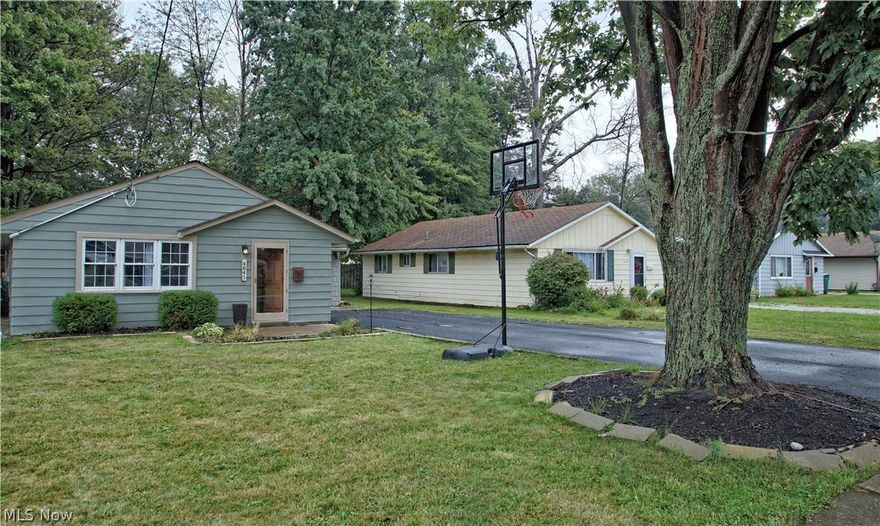 Welcome to this charming ranch in Mentor!  Travertine tile floor greet you as you enter the home.  The 3 bedrooms have newer carpet (2016) and custom built barn doors for the closets.  The kitchen has refinished hardwood cabinetry and newer Formica countertops (2016).  The bathroom was also remodeled in 2016.  The attached one car garage has newer garage door and opener, both were replaced in 2016.  The backyard is fully fenced in and has a large patio that is perfect for relaxing or grilling.  The furnace was installed in 2016, vinyl windows throughout, all appliances stay, central air, and a one year home warranty for the buyer.  Schedule an appointment to see this home today!