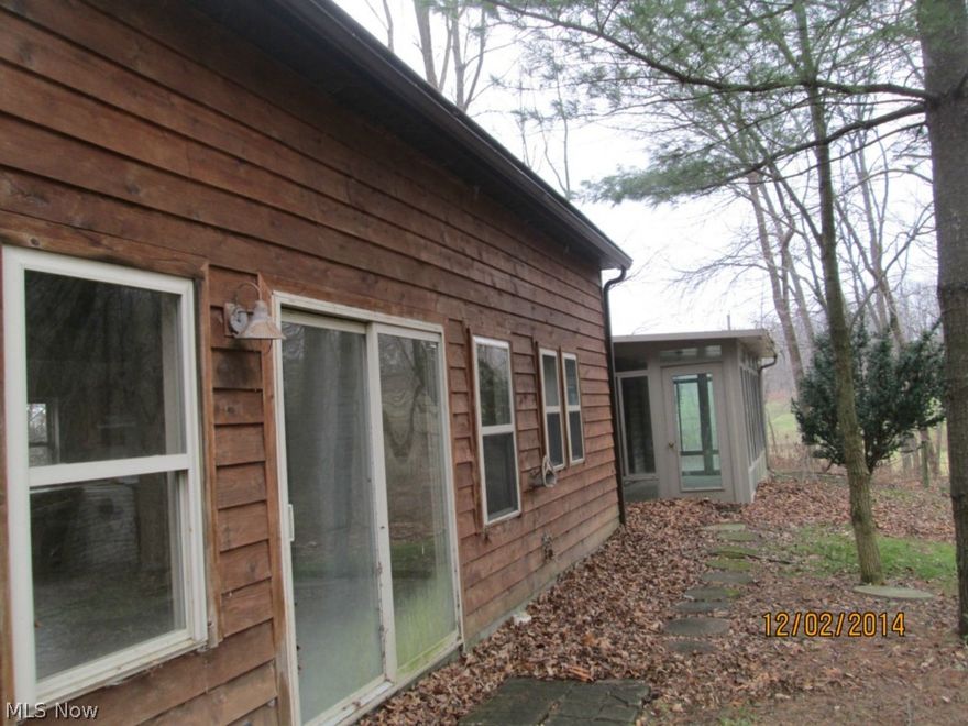 Cute 1 bedroom 1 bath cabin on 4.77 acres with several outbuildings. Great getaway!
