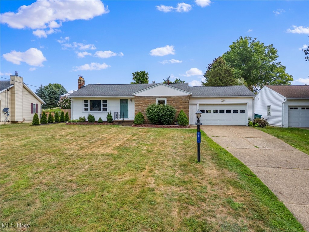This beautifully updated ranch is located in a desirable Canton neighborhood and comes with "lake rights" for endless fun. The main floor features 3 bedrooms and 1 full bath, while the fully finished basement expands your living space with a family room, a second full bath, a dry bar, a utility area, and a charming laundry room. When you're not enjoying the lake, relax in the cozy 3-seasons room overlooking the fully fenced backyard. Upstairs painted in 2025, water heater and roof new in 2019, A/C and furnace new in 2023.
