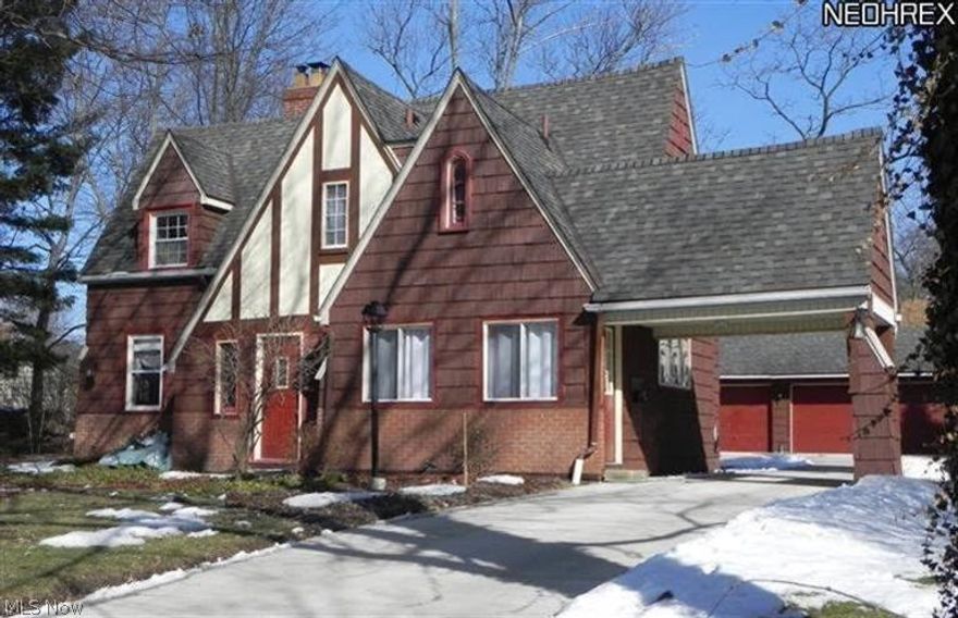 This 2 story Tudor has been lovingly updated w/modern conveniences for today's living while keeping architectural character of days gone by. The updated appliance kitchen has ample counter & cabinet space for storage & prepping your meals & baked items. The formal dining room & living room feature lovely built-ins & hardwood flooring. Family room is spacious featuring hardwood flooring, built-ins, loads of natural lighting, fireplace w/adjacent full bath & mudroom. Upstairs is an oasis of relaxation & features the master bedroom w/ensuite & sliding door to deck, 2 additional bedrooms, a full bath & an amazing library. This library has many purposes, quite reading, office, studio for artwork or study area. The high ceilings & skylight w/can lighting & hardwood floors & built-ins will dazzle you. There is a 3 car detached garage. Mt. Union is just a short walk away. New driveway Sept 2013, home repainted 4 yrs ago, attic insulated, 200 amp service, roof approx 15 yrs, newer brick facade.