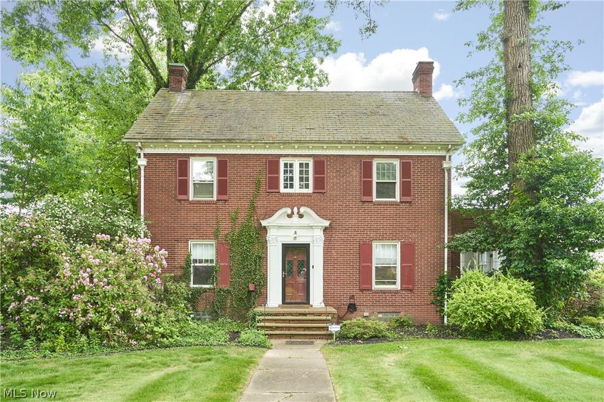 Don't miss out on this beautiful brick Colonial located on one of the quaint brick streets in the historic Ridgewood district. This home boasts an impressive front foyer that sets the tone for the elegance within, featuring exquisite crown molding and beautiful hardwood floors throughout. The large, eat-in kitchen is a chef's dream, equipped with custom Schrock cabinetry and seamlessly connected to a spacious formal dining room, perfect for entertaining. The expansive living room is adorned with an oversized crown mold and a cozy wood-burning fireplace, flowing effortlessly into a 4-season sunroom bathed in natural light. The first floor is rounded out with two well-appointed bathrooms, one of which includes an oversized no-threshold shower with grab bars and a handheld shower head for convenience and safety. On the second floor, you will find three generously sized bedrooms, two full baths, and a versatile bonus room that could serve as an office or nursery. The third floor features a fully finished attic with an additional two bedrooms, providing ample space for family or guests. Experience the historic charm and sophistication of this remarkable home in the heart of Ridgewood. Being sold as-is; this one is ready for you to add your personal touches and make this house your home! Schedule your private showing today!