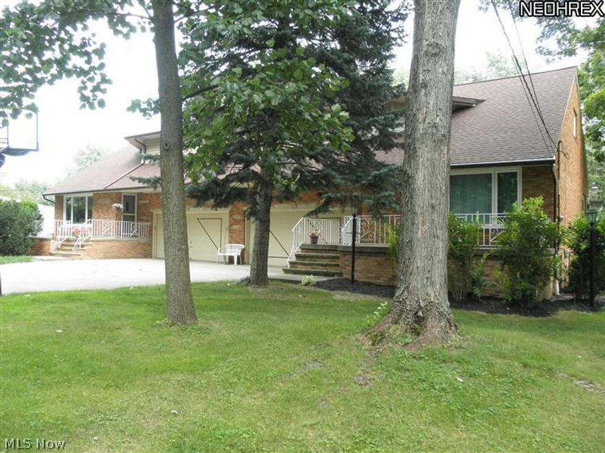 This beautiful all brick duplex is a rare find situated on an acre lot!!Each unit features 3 bedrooms, two and a half baths, large living room, family room, full finished basements which are separate, two car attached garage and front and back porches**Updates include; new kitchen with maple cabinets, wood laminate floors and granite countertops, central air, roof, gutters and downspouts, driveway, front porch, dishwasher, fresh paint and so much more! Garage floors have Everstone finish**Glass block windows in basement**All appliances stay including washers and dryers in both units**Basements have been fully waterproofed with a transferrable warranty**Back yard is wired for invisible fence**Loads of storage in the home plus a shed in the back yard for additional space**Enjoy the spacious private park-like back yard from the large back porch**The rents could be in the $1300 range for each unit!!