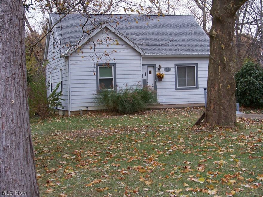 Looking for a home located on nearly 3 acres in the Green School system? Are you looking for space to garden and enjoy the outdoors? This property is an unusual find in Green. We are offering an extended cape with 4 bedrooms and 2 full baths. Main Bathroom has been updated with new fixtures, lighting, flooring and cabinetry. New flooring in second bath. Kitchen updated with oak cabinetry, new countertops, new sink, disposal, and Bosch dishwasher. The home is move in ready and includes a one-year home warranty. Other updates include all new lighting fixtures, ceiling fans, and fresh paint. Laundry connections exist on the first floor (in one of bedrooms) and in the basement. Original hardwood flooring under carpeting. A full, walk-out basement offers option for an in-law suite. Home also has newer roof, newer windows, newer water softener and new well pump. Two small creeks cross property and deer are often seen in yard. Paved parking for 6 or more cars or boats/RV. Storage shed.