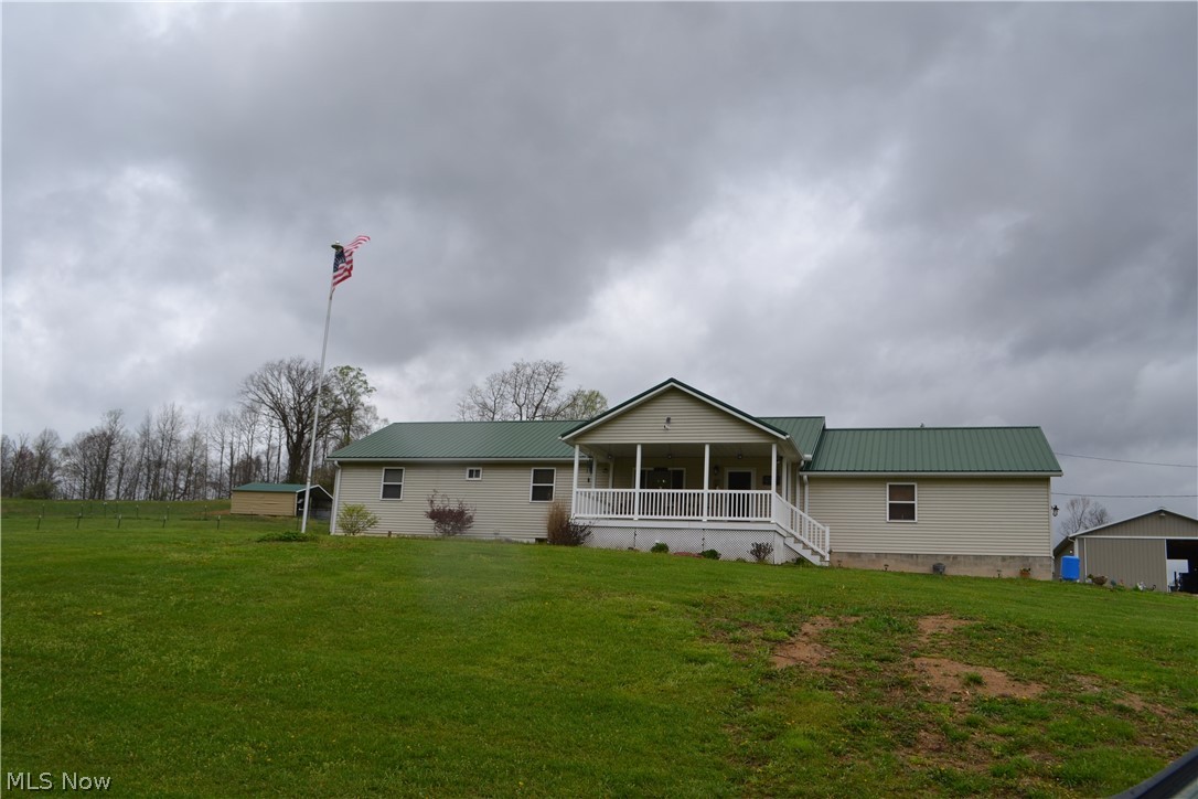 30.99 acres with Ranch style home /full bsmt,2 car garage, detached 3 car garage and ag.barn.