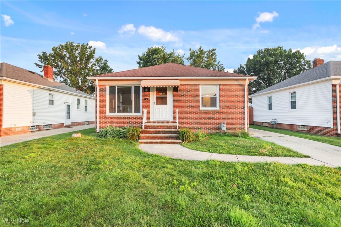 Welcome to this renovated, brick ranch style family home located in Parma! This features 3 bedrooms, 2 full bathrooms and a nice 2-car garage. The exterior features a newer roof, brick foundation, vinyl windows, a nice concrete driveway, concrete walkway, newly painted vinyl siding on the sides and a fenced in backyard. When you walk through the front door the kitchen features wooden cabinetry with a NEW granite countertop, tile surround, NEW fixtures, NEW stainless steel appliances and is connected to a nice dining room. The dining room, living room and each bedroom has refinished hardwood floors, full interior paint/trim and more. The fully finished out (1,064 square feet!) basement features NEW LVP flooring, full paint and trim, a 2nd kitchenette and the 2nd full bathroom. The mechanical room has a NEW furnace, central AC, a newer hot water tank and updated electrical. Come check out 3205 George today!