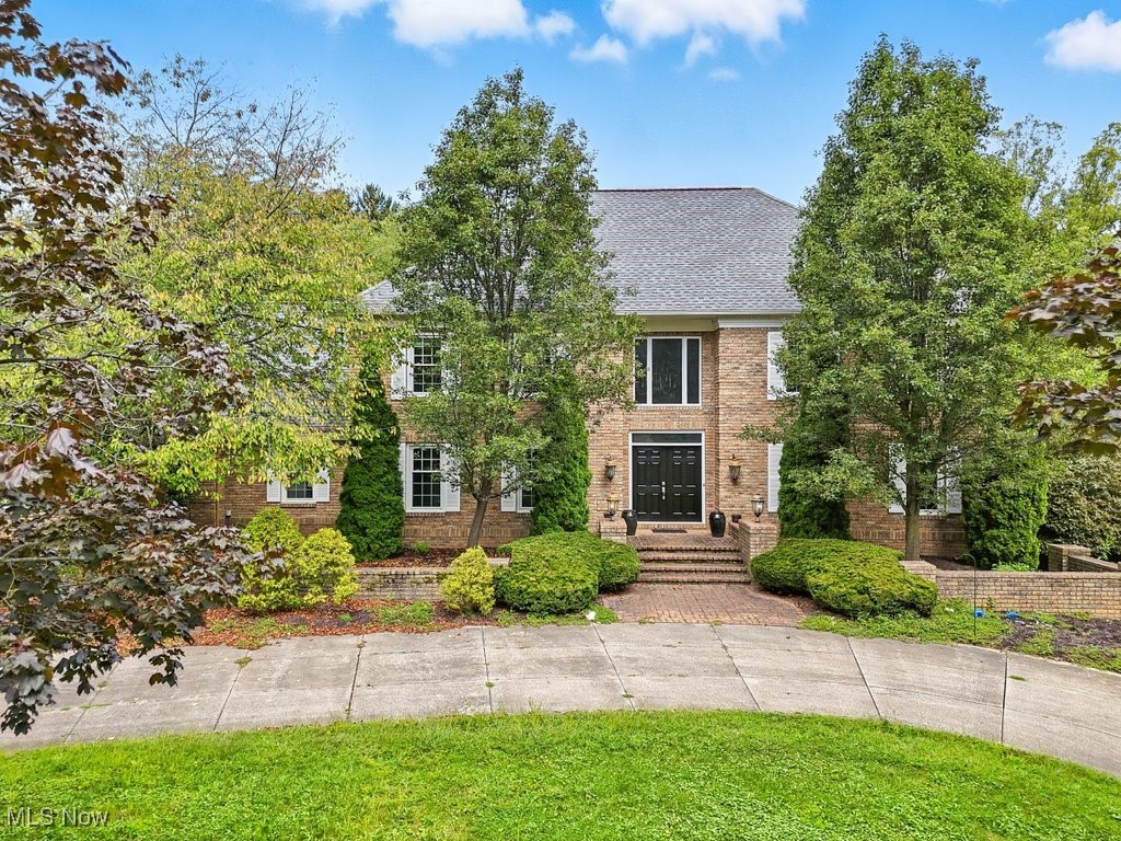 Stately brick col in The Sanctuary on 1 acre! 4,574sq.ft /1812sq.ft fin.LL, 5 brs/5.5 ba. Enter the grand 2 story foyer flank'd by form. liv & din rms, surrounded by walls of winds. flooding the home w/nat. light. A sweeping staircse w/modern steel bal-usters is a striking showpiece, complimented by marbled tile flrs, 2 guest closet/powd rm. Din rm is painted in George Washington green, sets a timeless tone carried thruout the home. The updated kit. feat. granite counters, newer tile flrs, ctr island, break. bar, SS appls: Jenn-Air range, smart blt in oven & convection microwave, DW & touch-free faucet. Storage is abundant w/walk-in pantry + built-in pantrys, loads of cab. & over 30 soft-close drawers. A slid. dr opens to an expansive, priv. deck w/bltin bench, dual stairs, & beaut landsc. A 2nd slid. leads to the massive fam rm w/10-ft ceils, wet bar & full-wall tiled frpl. 1st-fl den offers blt-in bkcases/clos (ideal gst br). A central hallway ties together fam rm, foyer & kit, creating a sought-after open feel. 1st-fl includes lau rm w/cabs, an expansive closet, access to full ba, & a mud rm off the 3-car gar. Upstrs hosts 5 bdrms/4 bas. Owner’s ste spans the ent. west wing w/mult. closets & luxury ba w/tile flrs, 5.5-ft show. w/dual shower heads/back jets, linen clos, copper sinks, labradorite counter & a showstopping 78” copper tub. Addit'l hi-lites incl. an 18x15 skylit art studio/flex spce & 5th bdrm ensuite, both accessible fro the 2nd priv. staircse. Bdrm 3 has ensuite, while bdrms 2 & 4 share a Jack & Jill bath beautifully designed w/playful sea urchins & whimsical ocean inspired theme that makes bathtime a fun adventure. The fin. LL offers lge rec rm, 2nd kit.& endless opts for entertain/or multigen living. Solid brick 2 story offers wonderful outdoor space for entertain, all w/the added security of a fenced backyrd. The side lot features a gentle hill-perfect for sledding fun w/the kids & friends. Roof 2023, renovated baths, new flooring & paint.