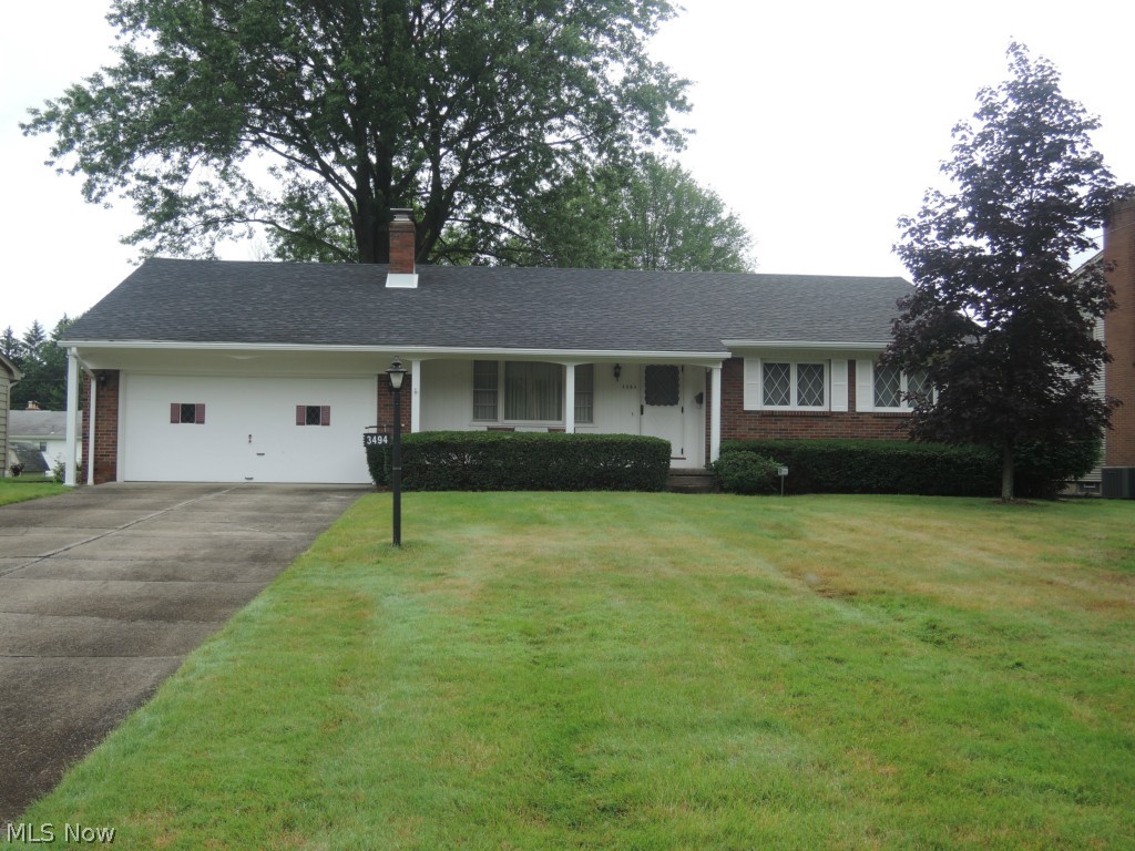 This is a great ranch floor plan. Brick exterior. Large room sizes and quality built construction. The home has been well taken care of, and it shows! Hardwood flooring underneath the carpeting also! Large living room! Huge picture window and a nice fireplace. The formal dining room accommodates a large furniture set. Tons of cabinets and counter space in this kitchen with a large dinette as well, door to a quaint covered side porch that overlooks the back yard. All Three bedrooms have excellent lighted closets, and are carpeted. Hardwoods underneath the carpeting if you prefer the wood floors! Partially finished basement, with a full bath, a partitioned laundry area, awesome additional closets, one is cedar lined, extra crawl space for lots of storage and a great sized rec area. The attached two car garage has auto door opener and pull down attic access. Beautiful exterior, landscaping and nice sized yard to enjoy! Additional humidifier, separate in the home, integrated into the furna