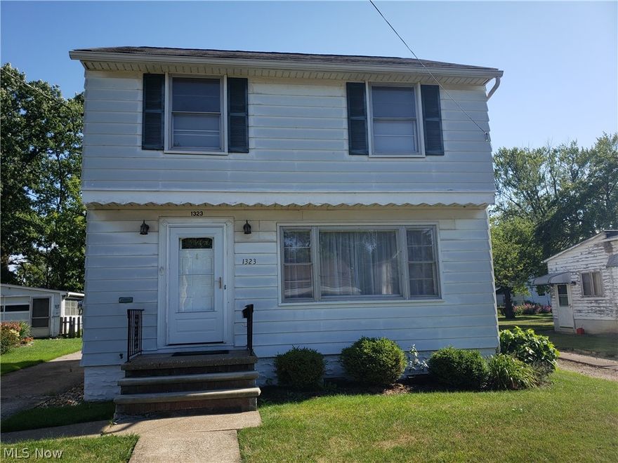 A classic three bedroom colonial that is in great shape and ready for the next owner.  Close to Lakeview Beach Park.  Fresh paint.  New carpet on first floor, staircase and hallway.  Hardwood floors in bedrooms.  Update breaker panel.  Large sun porch.  All appliances stay.  1 car garage with door opener.