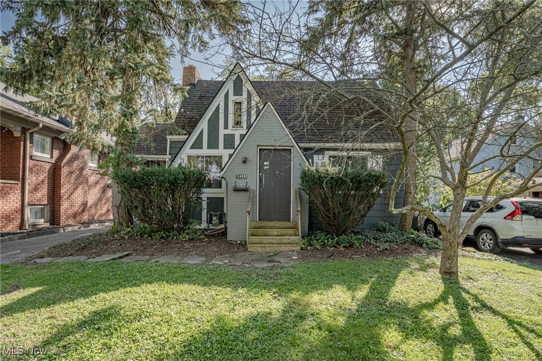 Welcome to 3496 E. Scarborough, a charming bungalow home nestled in Cleveland Heights. This residence
boasts 3 bedrooms, 1 bathroom, and just about 1000 square feet of living space. With some ambition, this home can be
restored to its beautiful charm with leaded glass windows, and hardwood flooring throughout. The kitchen has been
partially updated with LVP flooring and newer cabinets. The home is equipped with central air, carpeted bedrooms with
first floor primary and guest bedroom with full bathroom. The laundry is located in the unfinished basement, which also
includes additional storage space. Outside is a partially private lot with plenty of space to entertain.