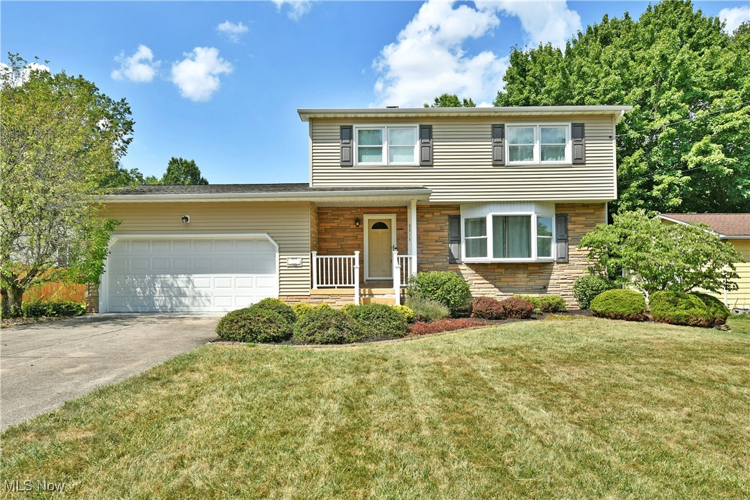 This Austintown colonial exudes pride of ownership at every turn. Upon your initial approach, you will be delighted by the beautifully renewed exterior and concrete driveway leading to an attached 2-car garage (with new opener & video keypad -2020). The well-groomed landscape along with the updated vinyl siding, windows and roof, leave nothing to do but fall in love! Did I mention that the home is situated on a private dead-end street conveniently located near shopping, restaurants and the highway? Inside the beauty continues through the clean, neutral first floor with updated kitchen appliances, an updated half-bath, access to a composite maintenance free deck and plenty of living space. Off the garage you will be pleasantly surprised by the oversized 3-season room lined with sliding glass doors and access to the deep backyard. Upstairs are 3 bedrooms with ample storage and a renovated full bath. The basement is home to a wood burning stove, laundry area, and rec-room/storage areas. List of updates/improvements in supplements. Furnace/AC Dec'24, windows 2010, HWT 2022 and so much more. Call today for your private showing!