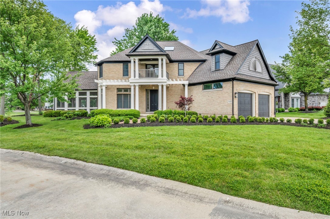 Nestled in the prestigious Red Tail community of Avon, this custom all-brick home offers luxury living with breathtaking views of the 10th fairway and green. Set on a premier executive lot, the property boasts 4,405 total sq ft across three beautifully finished levels, including 4 bedrooms, 5 bathrooms, and 4 fireplaces. The main floor is designed for both comfort and entertaining, featuring a premium chef's kitchen with new stainless-steel appliances, a large island, and its own cozy fireplace. An impressive family room with sweeping golf course views and another fireplace adds to the home's charm. A first-floor bedroom with private en-suite offers flexibility for guests or multi-generational living. New hardwood floors add warmth and elegance throughout. Upstairs, the spacious owner's suite includes a spa-like bath, walk-in-closet, and a fireplace-perfect for relaxing mornings with serene views. Two additional bedrooms, a laundry room, a sitting area, and a flex room ideal for exercise or a studio complete the upper level. The finished lower level includes a study area, half bath, fireplace, ample storage, and direct access to the oversized garage. Several covered outdoor living spaces extend your entertaining and relaxation options year-round. Located in Red Tail, home to a Von Hagge-designed golf course and elegant clubhouse, this residence offers a rare opportunity to enjoy luxury, tranquility, and an active lifestyle in one of Avon's most sought-after neighborhoods.
