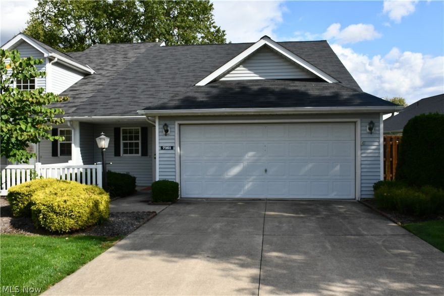 Wonderful unit surrounded by tons of green space.  2 bedrooms feature soaring ceilings and 2 full baths.  This unit has a huge dining room with soaring ceilings, kitchen with eating space, gas fireplace.  Unit features gorgeous hardwood flooring, ceramic tile in kitchen and baths and brand new carpeting. There is a office/den space that could be converted to a bedroom if needed.  Outdoor patio has retractable awning.  Large 2 car garage with lots of storage space.