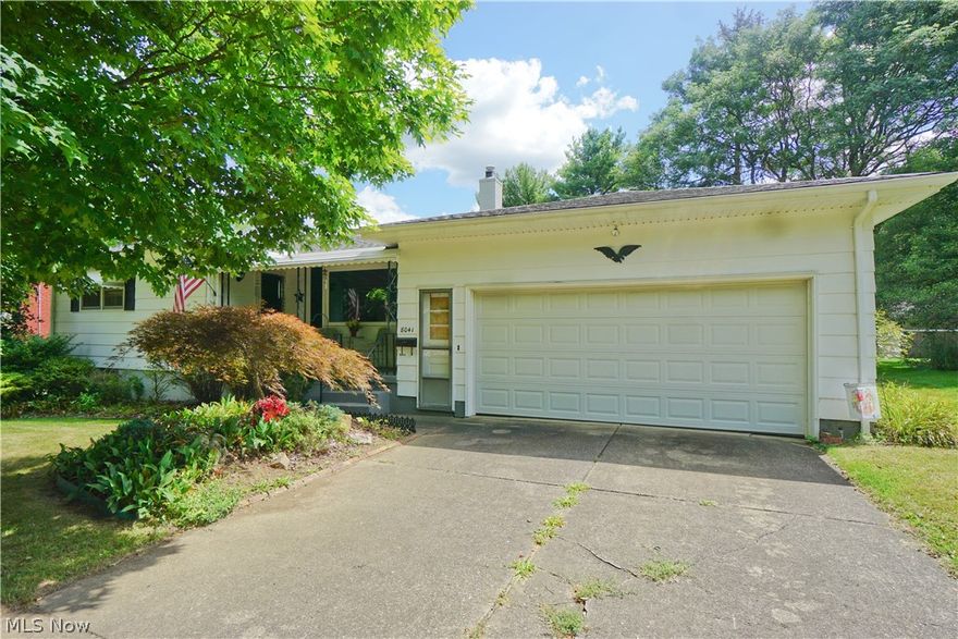 3 bedroom, 1.5 bath ranch home on over 1/2 acre in Boardman Schools.  Nice sized kitchen with breakfast bar and all appliances, refrigerator, built in oven, gas cook top, dishwasher, & microwave. It opens into the dining area with built in, lighted, curio cabinet.  Sliding glass doors (with blinds between the panes) lead out the 16x16 wood deck and the picturesque view of the back yard. Approx 1/2 of the back yard is fenced in.  Spacious living room with large picture window and guest closet. The master bedroom, can easily accommodate a King size bed and has 2 double closets.  The 2nd bedroom is the same size and has a double closet.  3rd bedroom has has a double closet.  Full bath. There is a nice walk-in cedar closet in the hall! Full basement is ready to be finished!  It already has tiled floor and a drop ceiling. 2 car attached garage.  All of this and a screened in patio/sun room, accessible off the garage. A  one year 2-10 home warranty for the buyer.  You can catch of glimpse of