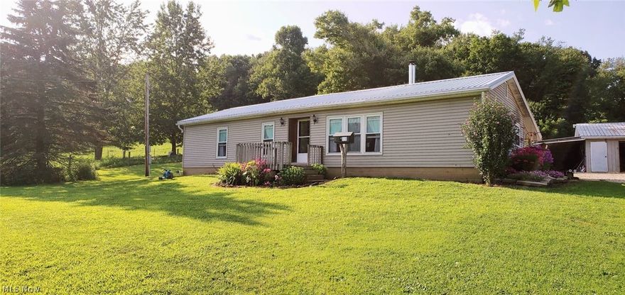 Country living with 10 acres, ranch mfg home, large front/back yard - fence for livestock - horse barn 3 stalls - workshop shed - 1500 sq ft home is open concept - large living room - dining room and kitchen - 2 bedrooms (previously 3 to convert if needed) large mudroom - crawl space - home is immaculate - and beautiful landscape - newer metal roof - currently set up without electric/furnace/septic - however was previously - all the plumbing, electric work still there - free gas - royalty checks and mineral rights transfer - conventional/cash financing Centrally located between Fallsburg and Nellie - situated on a state route 79 outside of Fallsburg.