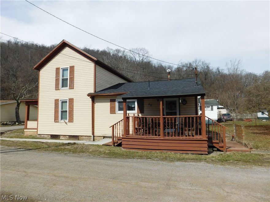 Look at the potential of this 3 Bedroom 2 story Home with fenced in yard and detached one car plus additional carport.