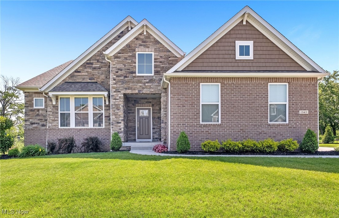 Welcome to 1343 Skyland Falls Boulevard in picturesque Hinckley—a haven of comfort and style. This captivating 3-bedroom, 2.5-bathroom home offers a sprawling 3,922 sqft of thoughtfully designed space perfect for those who cherish a blend of luxury and practicality. Step inside to discover an inviting open floor plan that seamlessly integrates living spaces. The great room is a highlight, featuring a striking stone gas fireplace and plush carpeting, ideal for cozy family gatherings. The modern eat-in kitchen is a chef's delight, adorned with sleek white cabinets, stainless steel appliances including a countertop range, and a generous island that doubles as a breakfast bar. Entertain effortlessly as this space flows naturally to other living areas. The primary suite is your private retreat, boasting a lavish bathroom equipped with double vanities, a walk-in tile shower, and a separate toilet room. A second bedroom enjoys the luxury of its own private bath, while an additional bedroom and a half bathroom complete the main level. Convenience is at your fingertips with a main-level laundry room and ample storage. The fully finished basement offers endless possibilities with a large rec room covered in soft carpet, ensuring entertainment for all ages or a peaceful escape for hobbies and relaxation. A 3-car attached garage provides expansive storage and parking solutions. Outside, the 12x15 covered patio invites alfresco dining or evening relaxation, overlooking a lush, expansive grass yard ideal for outdoor activities and gardening alike. Nestled in a tranquil setting, this residence is ready to become your forever home. To experience its charm firsthand, schedule a viewing today. Contact us to see how 1343 Skyland Falls Boulevard can perfectly complement your lifestyle.