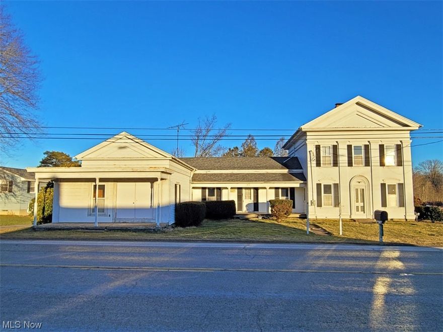 Intriguing home and property on 2.78 acres near the intersection of Mayfield Rd (Rt 322) and Rt 7 / Built in 1857, this property was once a general store-residence- and a post office /  Much of the original floor plan and ornate trim is still very well preserved /  Second floor kitchen-bedrooms and bath could easily be separate apartment / Basement storage or workshop / Two garages served the owner well with his hobby of car restoration / So many possibilities here / It all starts with a tour of this property to see how this might fit your plans and ideas / You will be pleasantly surprised at the quality of old-time carpentry!
