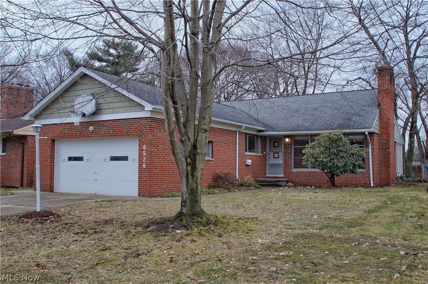 Welcome to this rare find on a spacious .24 acre property in Parma Heights. This brick Cape Code includes over 2,600 living sq ft that includes a nicely finished basement with bonus room and a 1/2 bath. This home features 3 bedrooms, 2.5 bathrooms, a 2-car attached garage, an Owners Suite with on-suite bath, kitchen with plenty of cabinet/counter space and all stainless steel appliances, family room with stone fireplace, dining room with built-ins, remodeled sun-room, a cozy loft area with lots of natural light and unique architecture/design. A large fully fenced-in backyard with a patio completes the tour! Since purchasing the home, the sellers have spent thousands of dollars on home improvements making it in the condition it is today. Updates include: replaced furnace, A/C unit, hot water tank, dryer, dishwasher, garbage disposal, refrigerator, and stove. Installed hardwood flooring in dining room and hallway, installed carpet in living room and 2nd floor, remodeled  bathrooms, repla